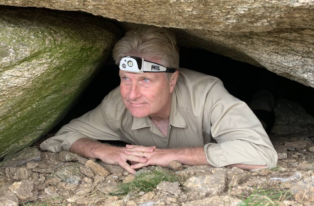 Eric Warrant emerges from a cave on the western slopes of Mt Kosciuszko that contains tens of thousands of Bogong moths. Picture: Tim the Yowie Man
