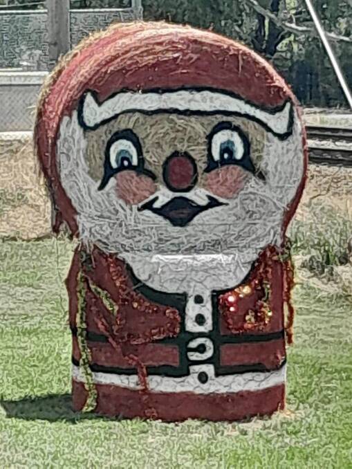 One of several roadside haybale Santas in our region. Picture by Dave Gray