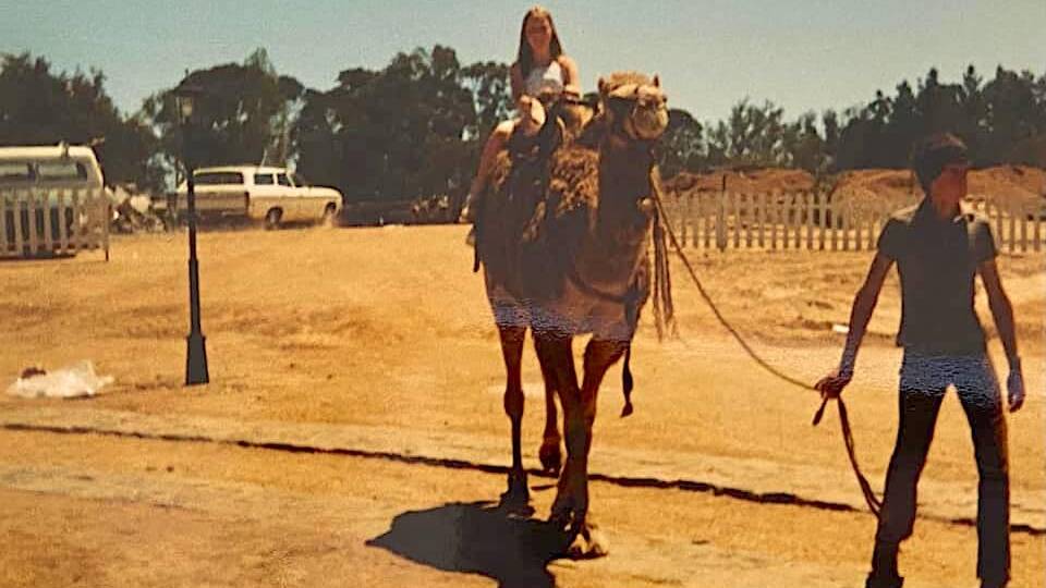 Cheryl Hodges enjoys a camel ride at the fair in the early 1980s. Picture: Cheryl Hodges