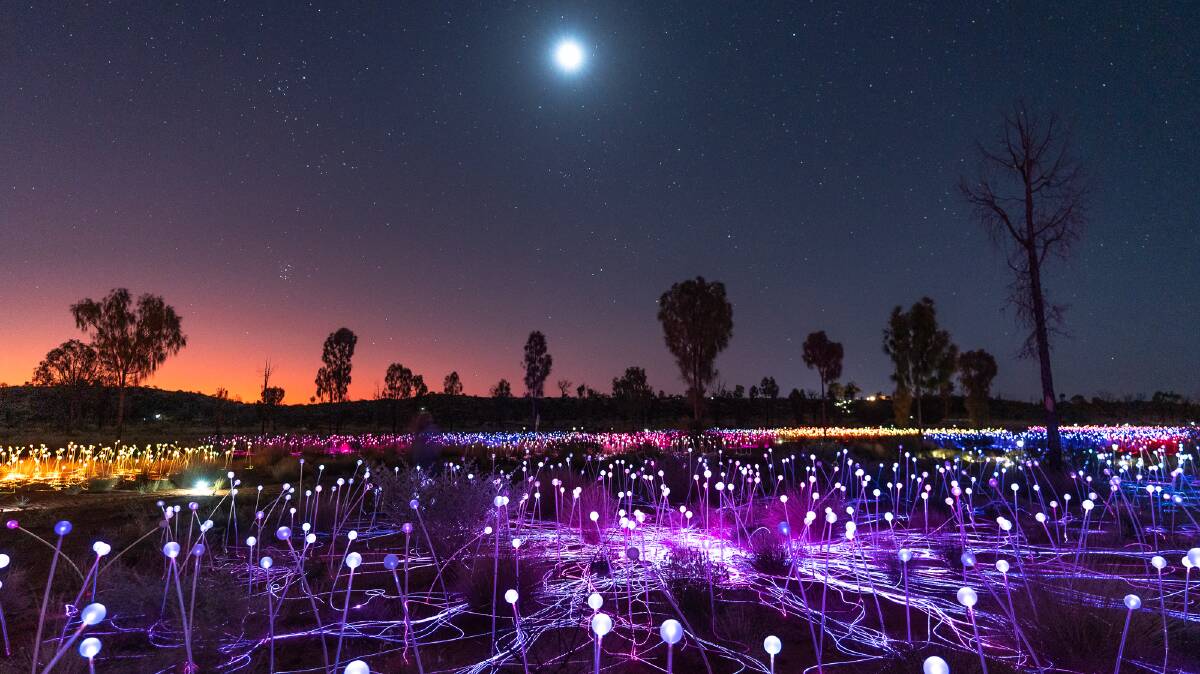 Fifty thousand colourful bulbs create the Field of Light art installation.
