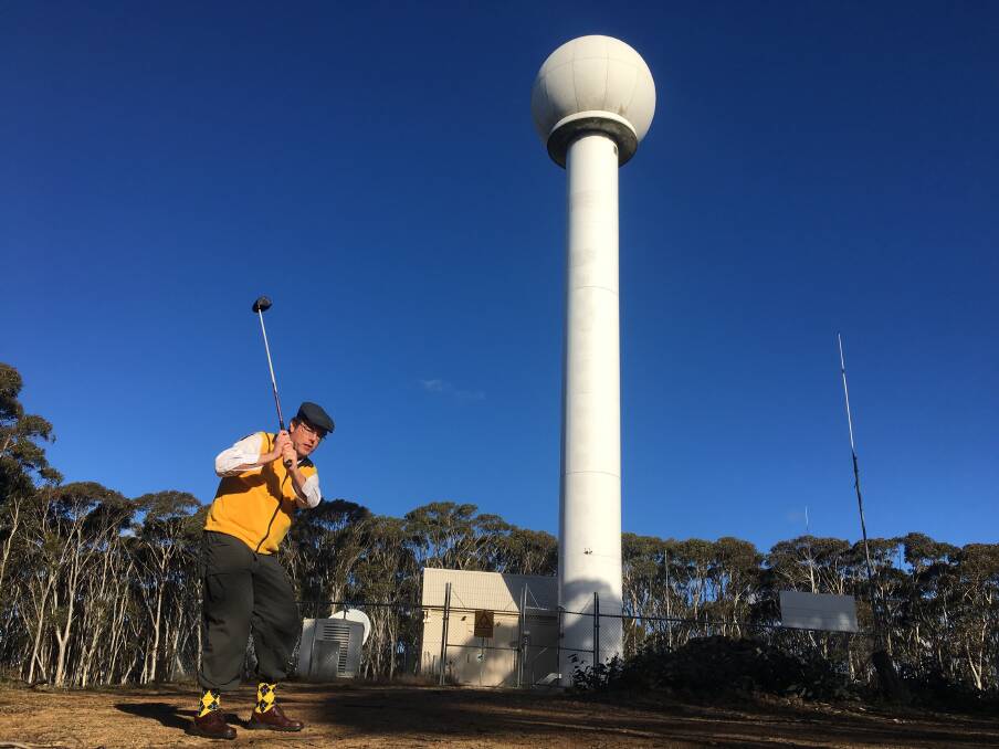 Tim at the Canberra region weather radar ... BYO golf stick! Picture by Sarah Marley