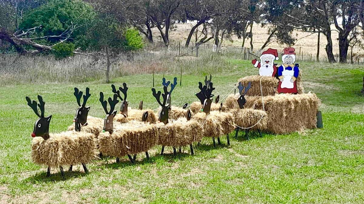 Mr and Mrs Claus and their hardworking reindeers enjoy a rest near Binalong. Picture by Dave Gray