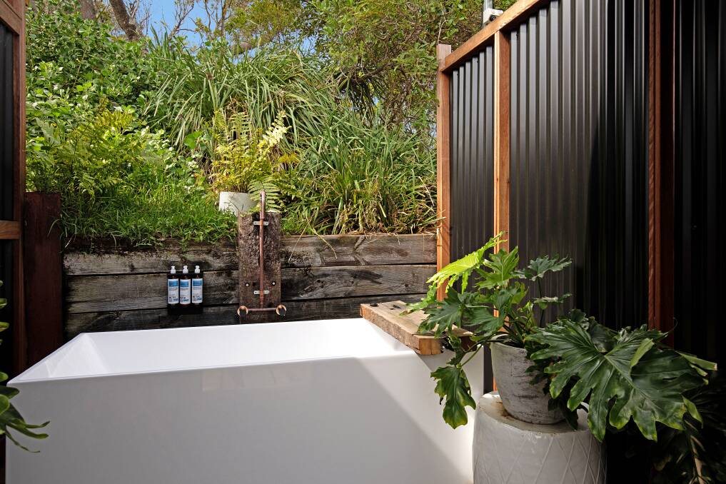 Our private outdoor bath. Don't worry, it's completely screened off to all but the wildlife. Picture: Supplied