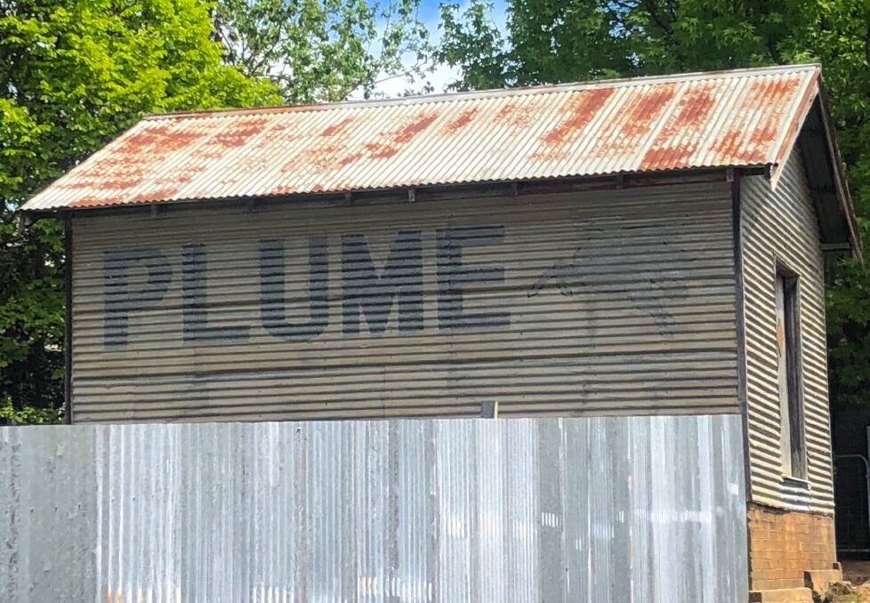 A Plume Petrol ghost sign in Batlow. Picture: Graham Pryce