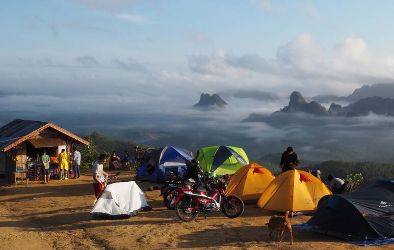 Campers grab refreshments from a rustic cafe at Thailand's Doi Tapang Viewpoint. Picture: Shutterstock