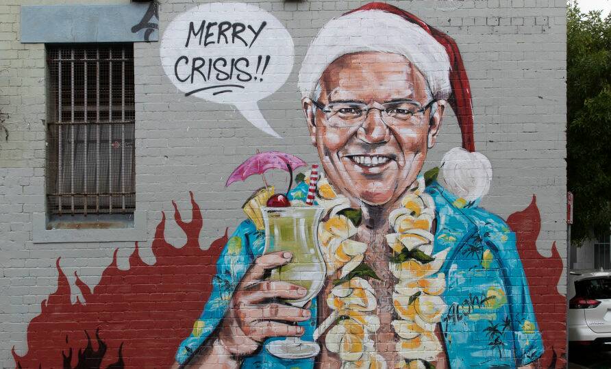 A mural by Sydney artist Scott Marsh depicting Prime Minister Scott Morrison on holiday in Hawaii. Picture: Getty Images