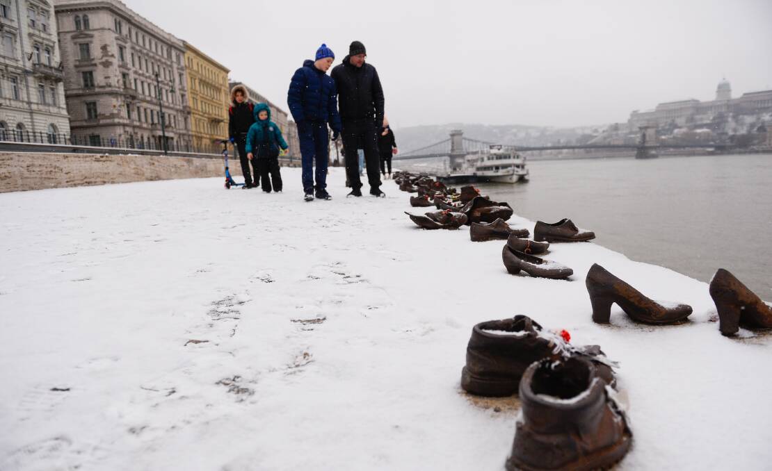 Pairs of cast-iron shoes along the Danube River serve as a reminder of the events of Word War II. Pictures: Getty Images