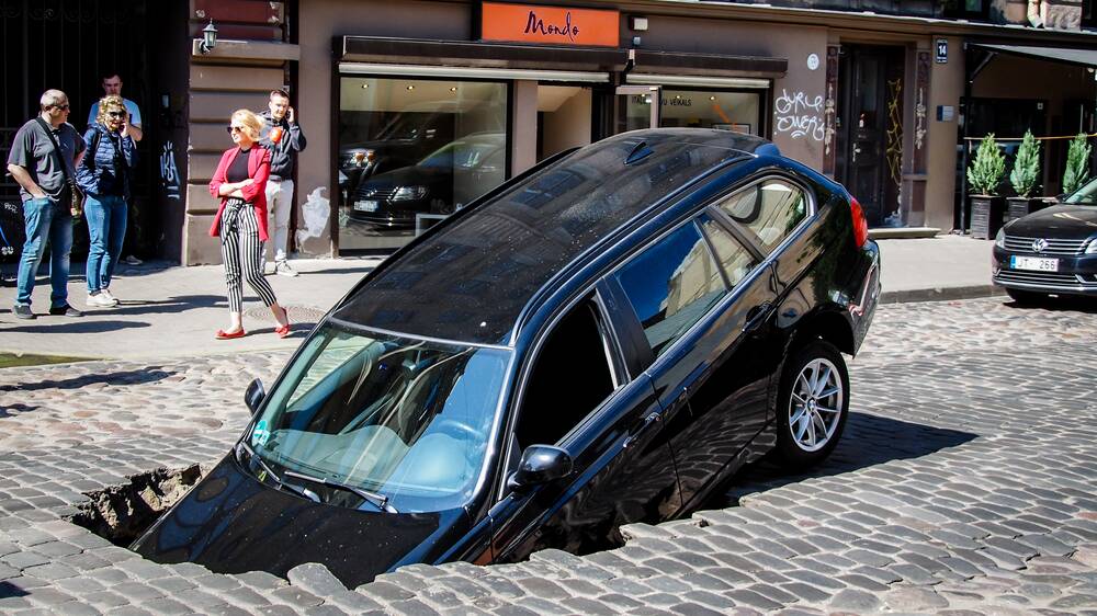 This car fell into a sinkhole in Latvia last year. Picture: Shutterstock