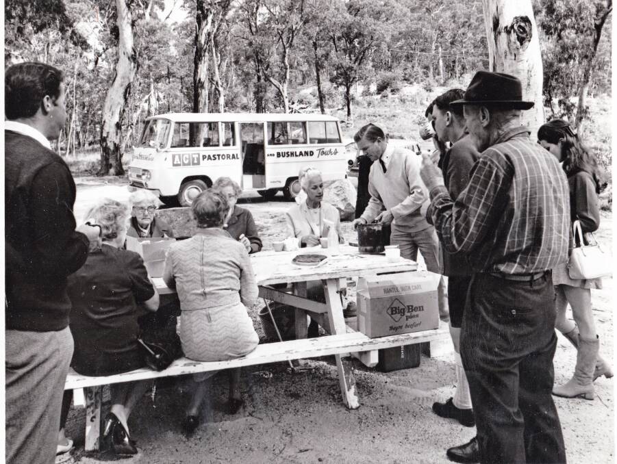 Guests tuck into a Big Ben pie on Keith Green's tour of ACT Bushland. Picture: Tidbinbilla Pioneers Association