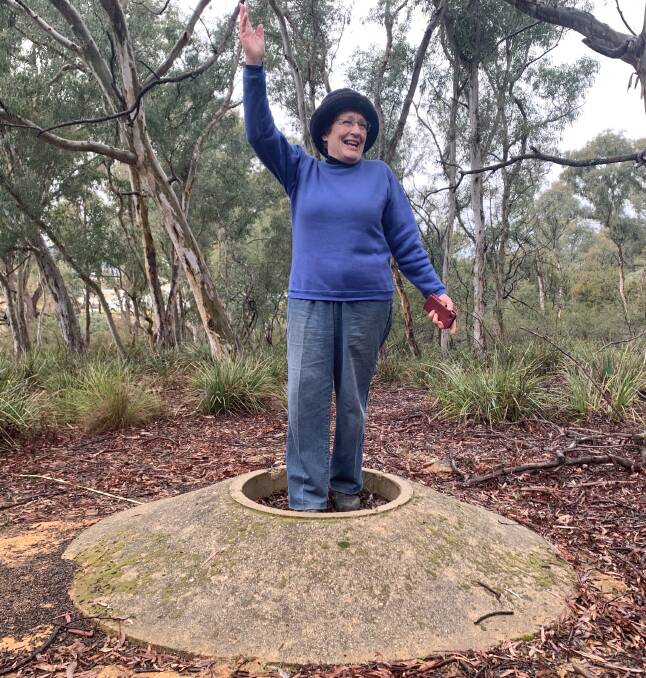 Linda Beveridge at the mystery concrete base. Picture: Tim the Yowie Man
