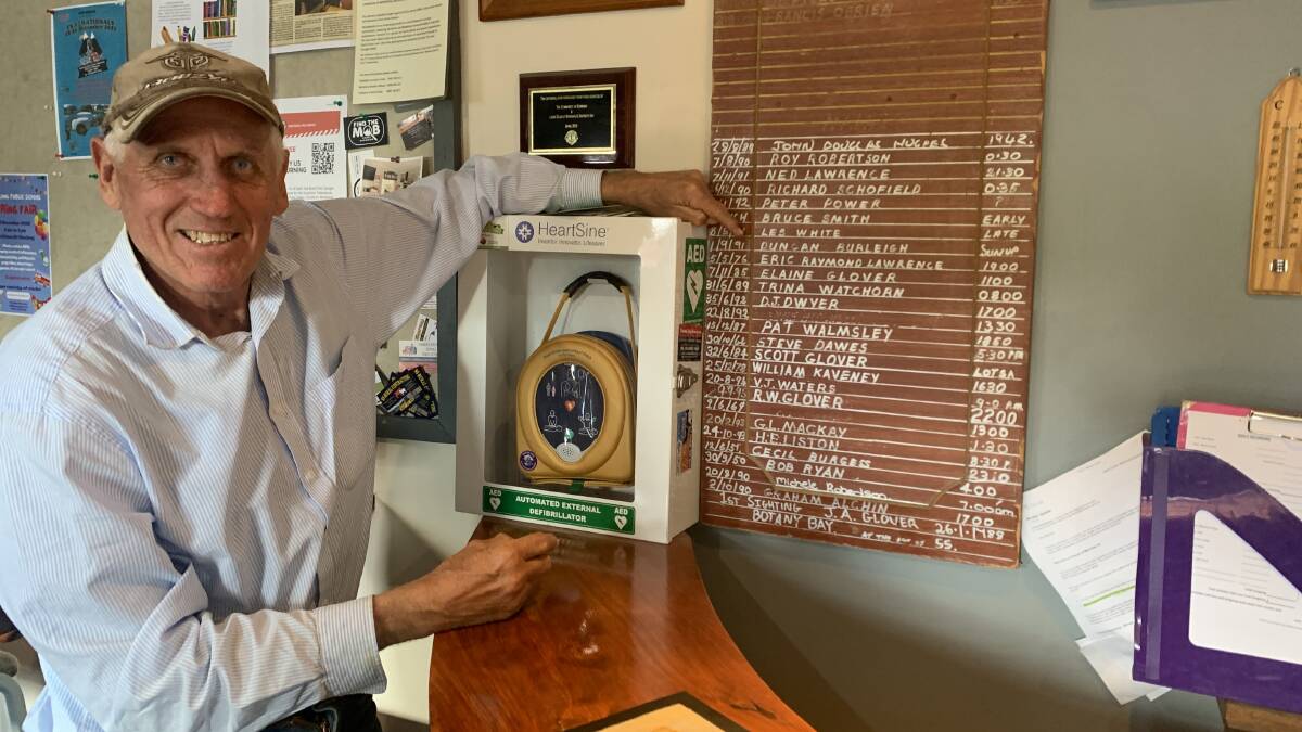 Duncan Burleigh points out his own name on the Pheazal Sightings honour board in the Bowning Pub. Picture by Tim the Yowie Man