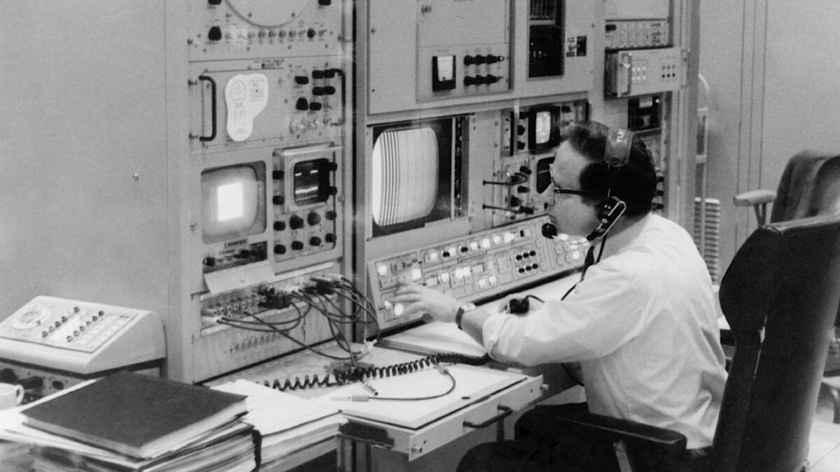 Ed von Renouard at the Honeysuckle Creek video console during the Apollo 12 Mission. Picture courtesy of honeysucklecreek.net