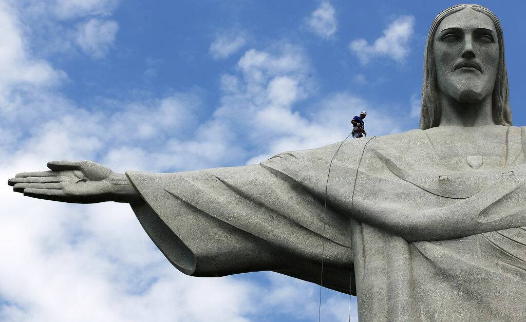Crews have begun adding more lightning rods to Rio de Janeiro's Christ the Redeemer statue. Picture: Getty IMages