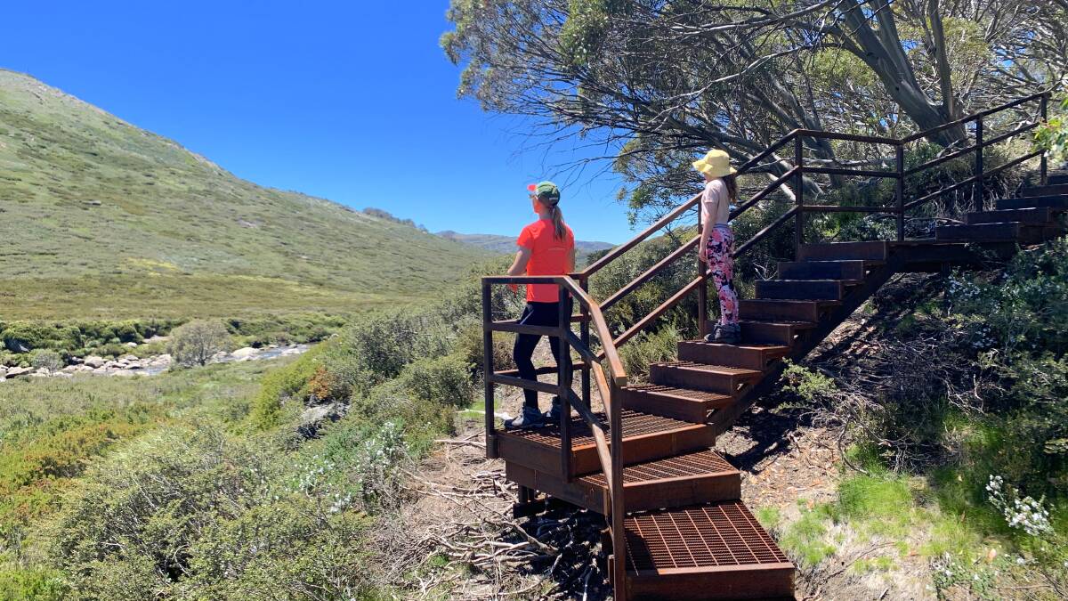 Tim's daughters Emily and Sarah take a break on the new walking track. Picture: Tim the Yowie Man
