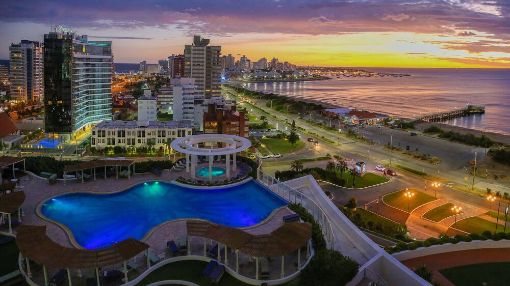 With pulsing beach bars and apartment blocks fronting the emerald sea, Punta del Este has built a reputation as the Miami of South America. Picture: Shutterstock