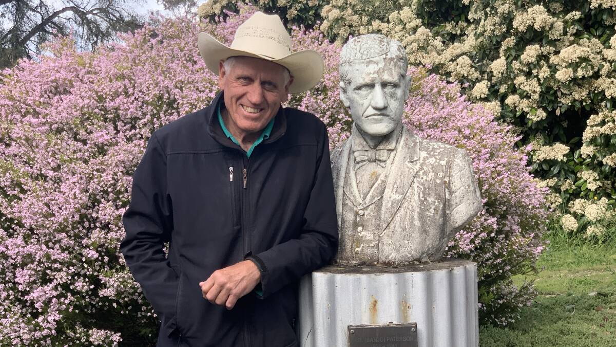 Duncan Burleigh at the bust of Banjo Paterson in Binalong, near Bowning. Picture by Dave Moore