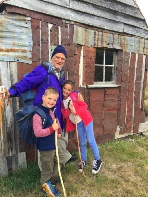 Klaus Hueneke with his grandchildren Zoe and Ben at Four Mile Hut in 2016. Picture: Abigail Curtis