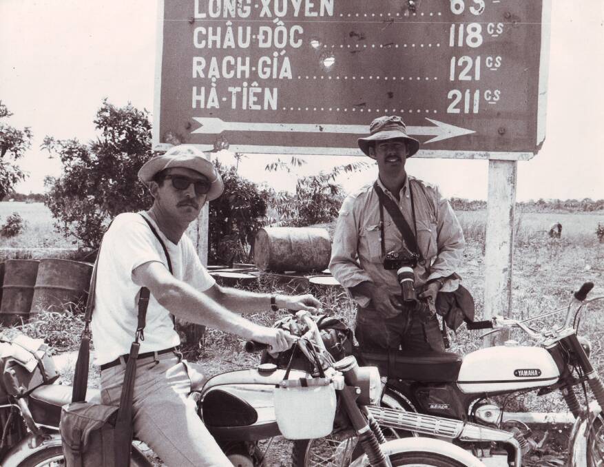 With good friend Sean Flynn, son of actor Errol Flynn, on a motorcycle trip into the Mekong Delta.