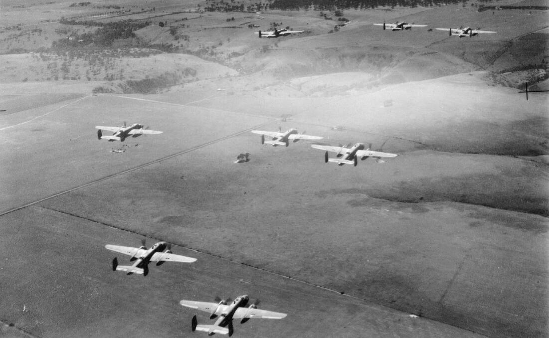 A formation of North American B25 Mitchell bombers belonging to No.18 Squadron, Netherlands Air Force, in flight over the countryside around Canberra in 1942. Picture:
Australian War Memorial