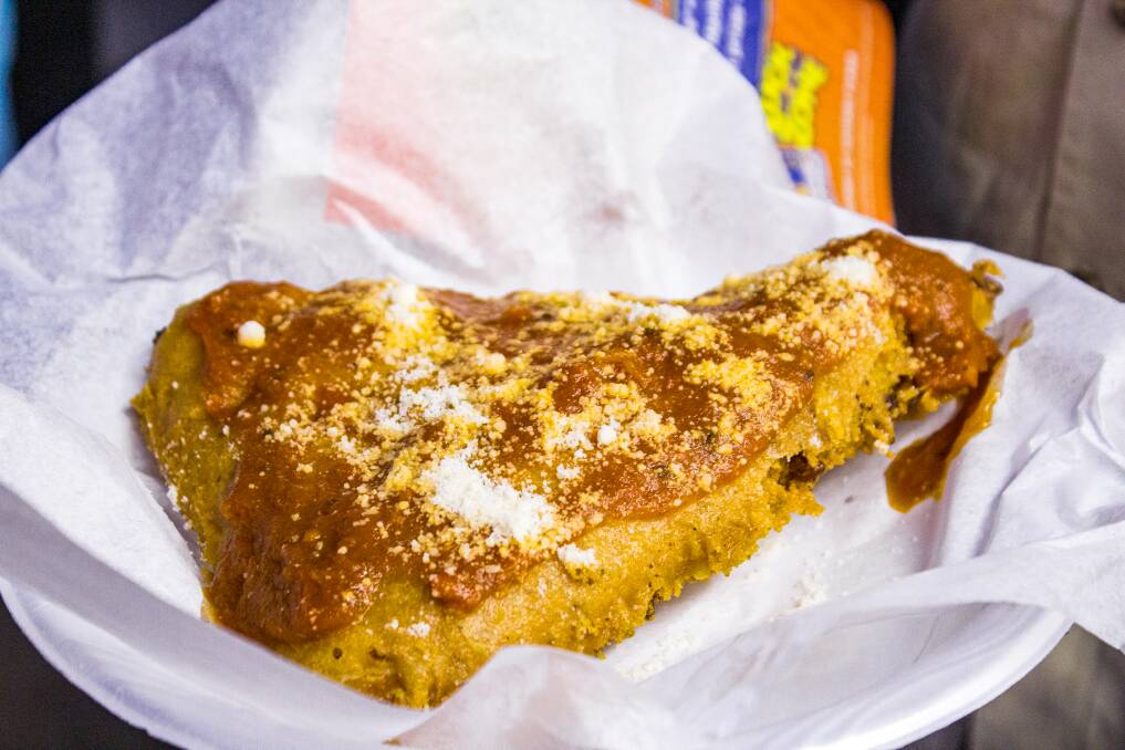 A deep-fried slice of pepperoni pizza is just one of the fried foods at a US state fair.