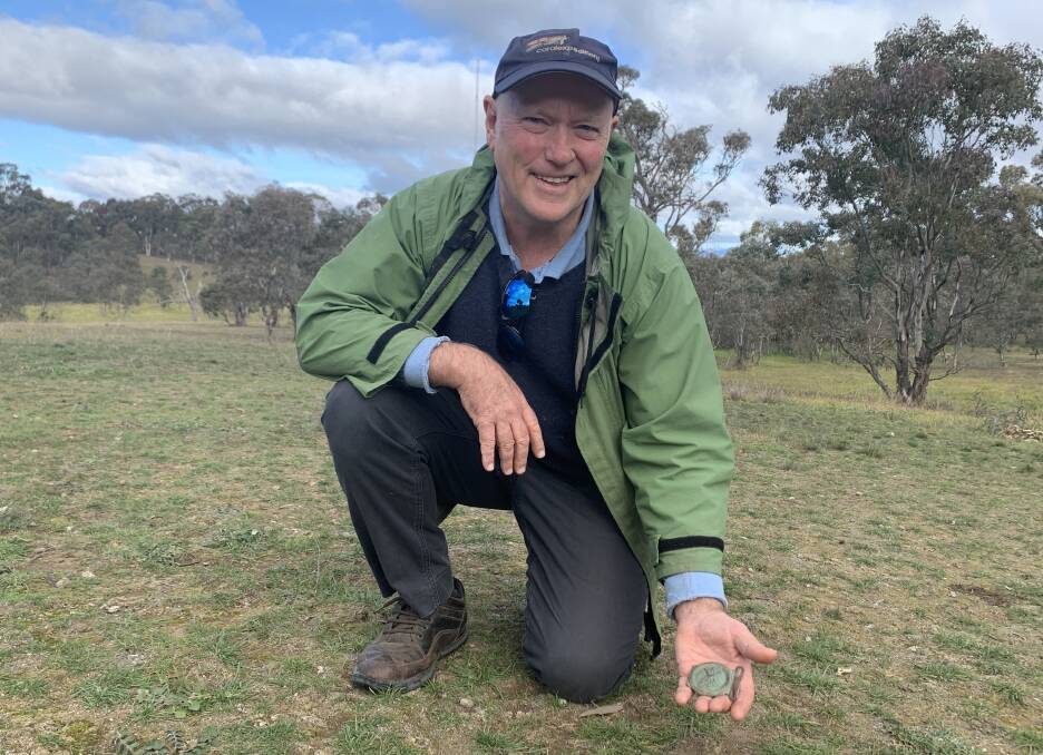 Mike Hermes at the site in the Crace Grasslands Reserve where he stumbled upon the historic cricket buckle. Picture: Tim the Yowie Man)