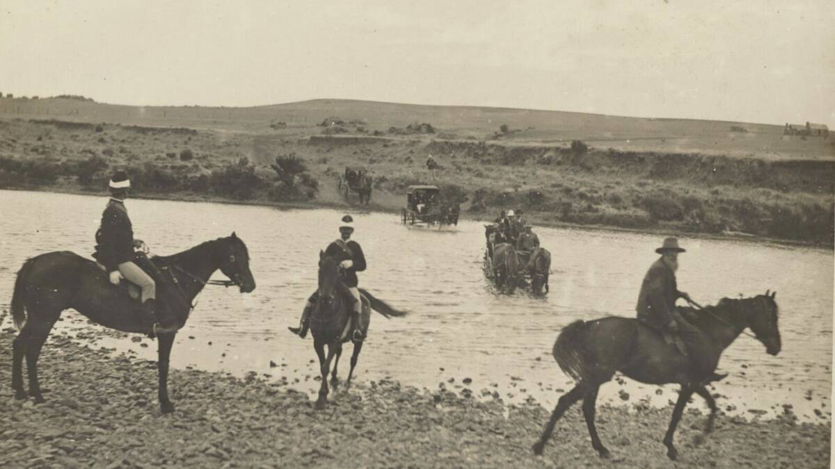 The senators crossing the Snowy River on horseback.