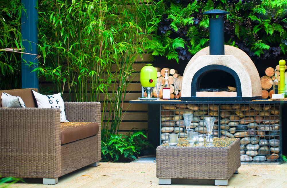 Gather some friends one weekend to build an outdoor pizza oven from scratch or a kit. Picture Shutterstock