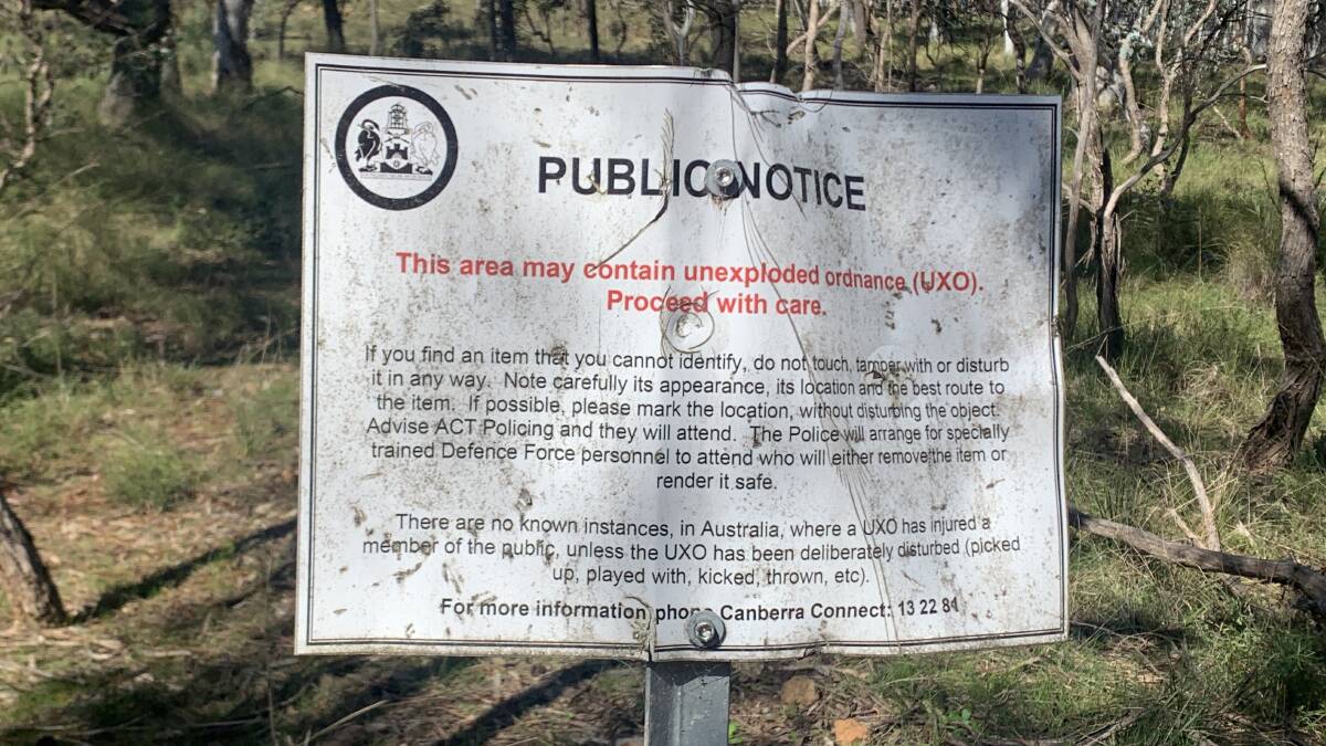One of several notices warning of possible unexploded ordinance if you wander off the track. Picture by Tim the Yowie Man