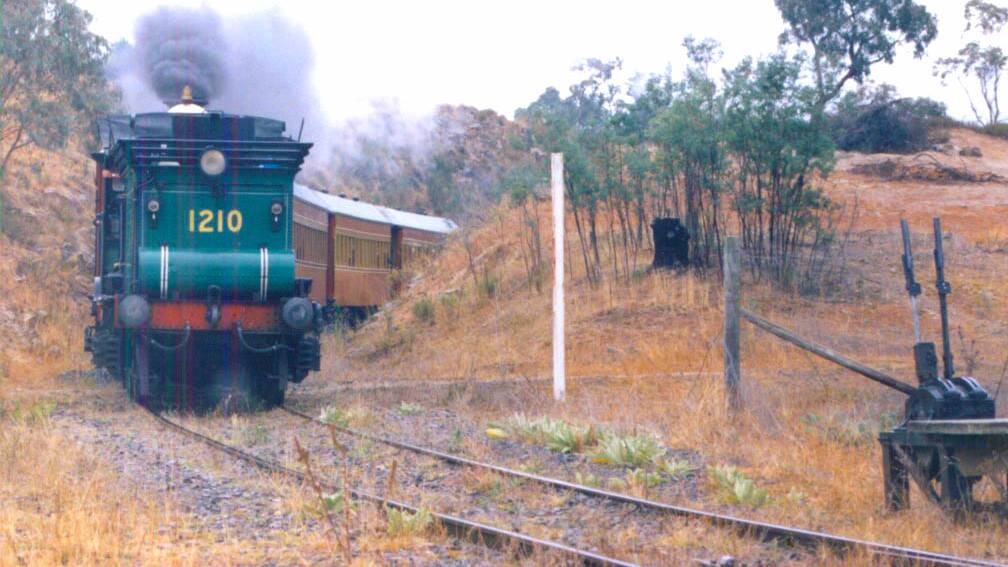 A steam train approaches Tuggeranong Siding circa 1990. Picture: Rebecca Lamb
