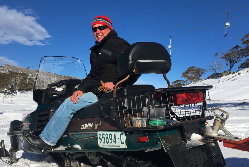  In winter, Steve Young rides his snowmobile to work. Picture: Tim the Yowie Man