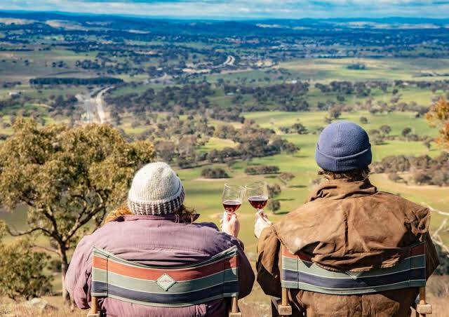 Stuart and Frances Atkins enjoy the view from atop Bowning Hill. Picture: Pat Lindley