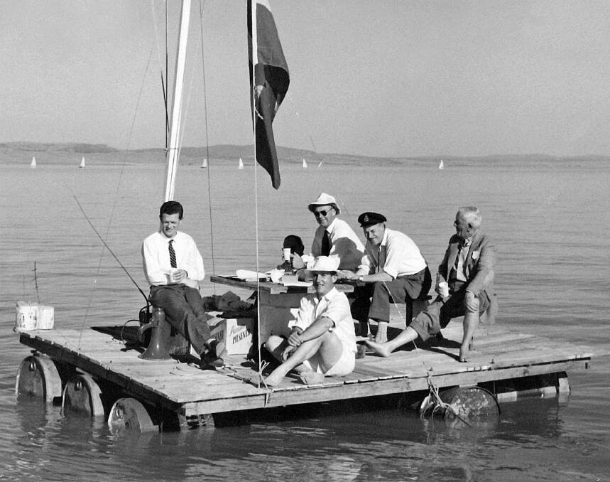 The starter's raft for the Canberra Yacht Club, photographed on Lake George in 1961. Peter Russell is in the deep shadow at the back of the raft. Picture: Canberra Yacht Club