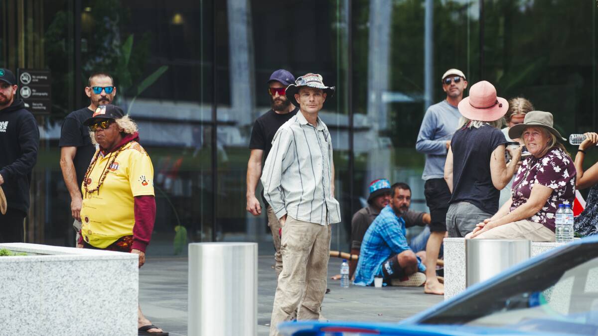 Protesters gather outside the ACT court as a man charged with arson has his case heard. Picture: Dion Georgopoulos