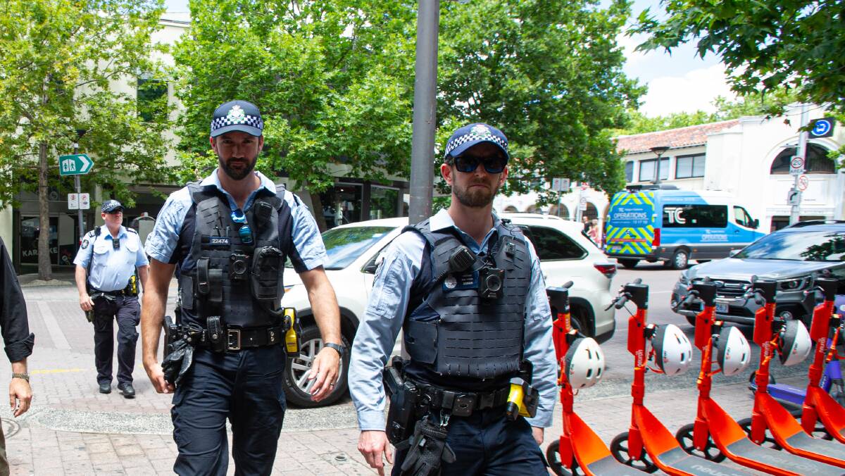 Police officers on the beat in Civic, wearing their body-worn cameras. Picture: Elesa Kurtz