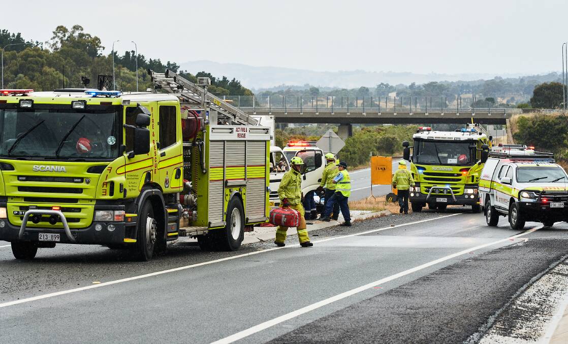 ACT Fire and Rescue attend a crash on the Federal Highway. Picture: Matt Loxton 