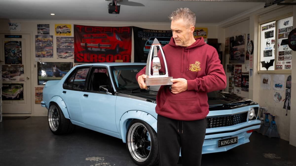 Jason Sandner with the Ring brothers' trophy from the Motorex show in Melbourne. Picture by Elesa Kurtz