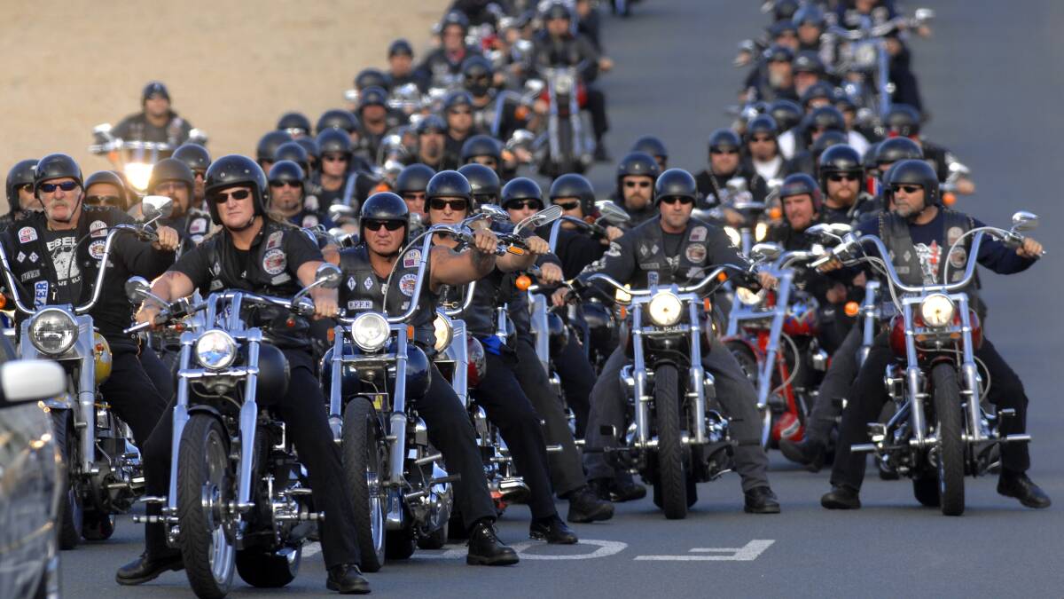 In 2009, hundreds of Rebels members rode into Canberra for the funeral of a life member. Picture by Graham Tidy