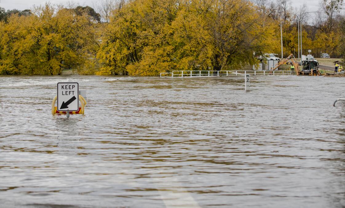 A flooded roadway in Queanbeyan. Picture: Jamila Toderas