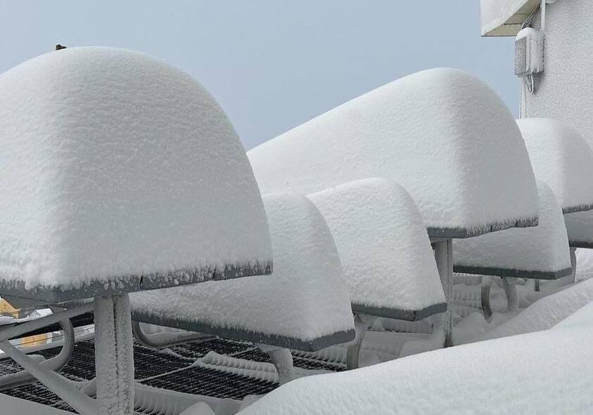 The tables at Perisher's mid-station cafe after the Tuesday night snowfall. Picture Social Media