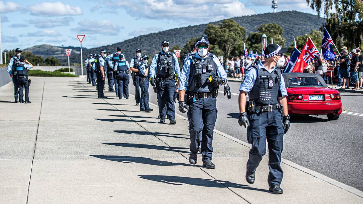 Police form up in front of the protesters earlier this month. Picture: Karleen Minney