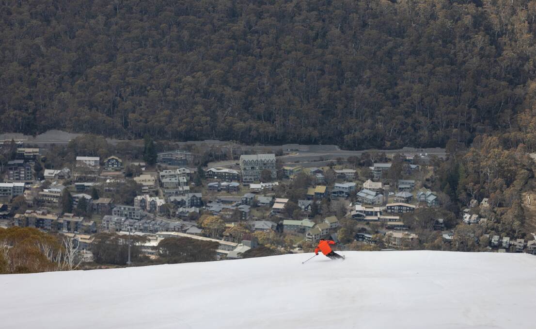 A lone skier heads downhill on the wide, vacant runs of Thredbo before the season closes. Picture: Supplied