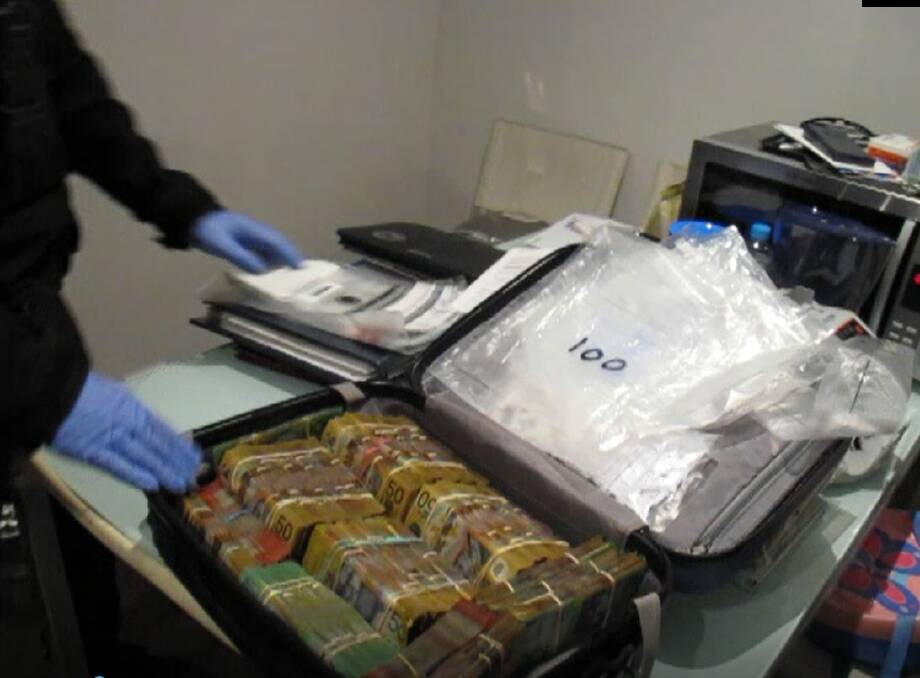 Suitcase full of cash seized through Operation Ironside. Picture: AFP