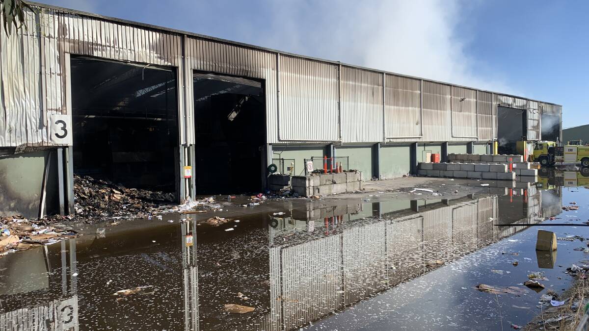 After a fire triggered by a lithium battery, tonnes of water were poured into the Hume recycling facility and it still smouldered for days. Picture by Peter Brewer