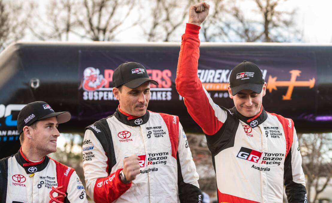Local Toyota rally drivers Lewis, left, and Harry Bates, right, flank co-driver John McCarthy during post-event celebrations. Picture: Supplied