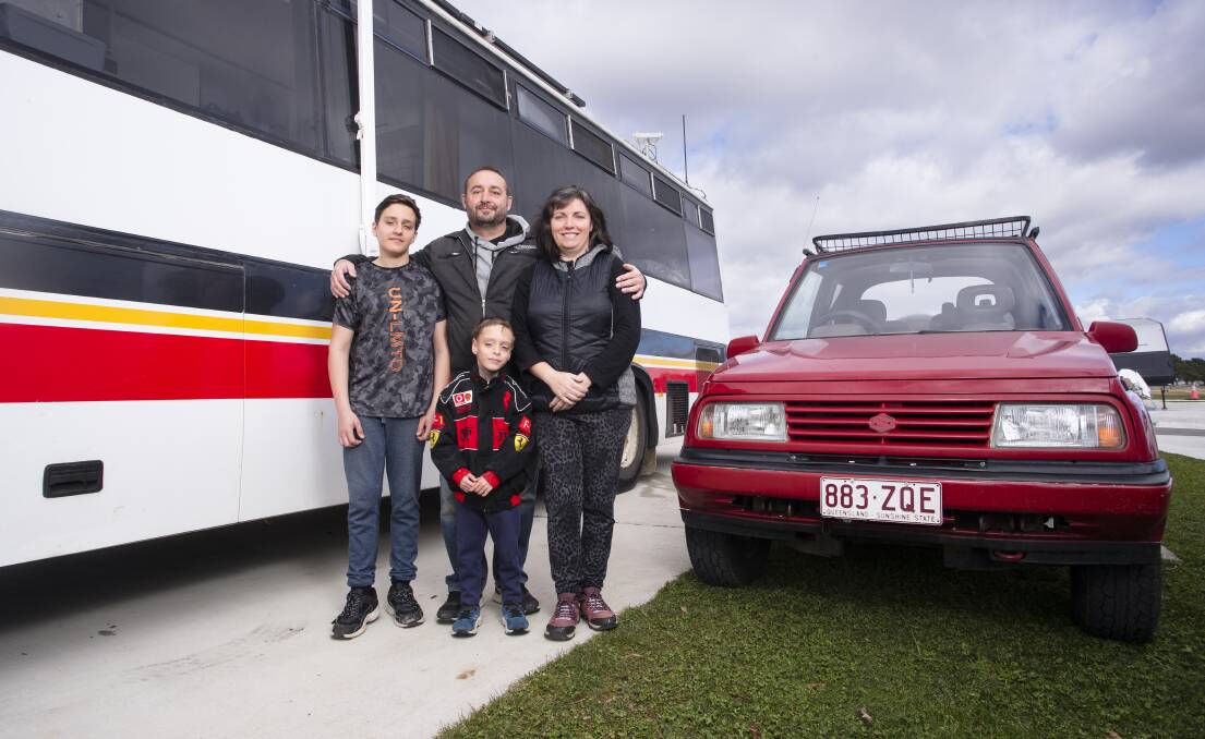 Matthew and Diane Blight, with sons Conor, left, and Callum, and their much-travelled rig for their "big lap" of the country. Picture: Keegan Carroll