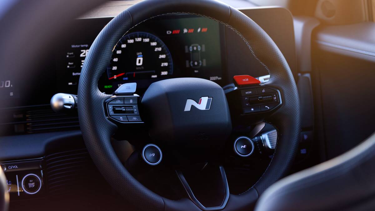 Buttons on the steering world turn the silent Hyundai EV into a noisy one. Picture supplied 