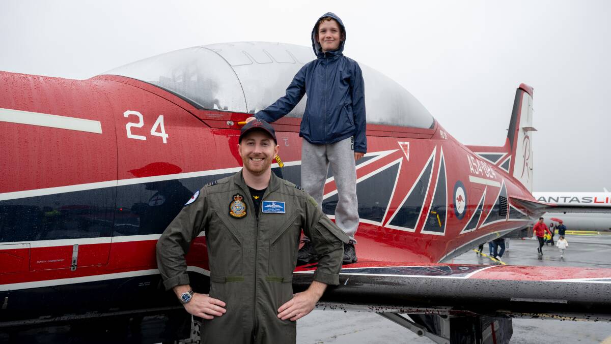 Roulettes flight instructor Josh Tamm, from Canberra, with 12-year-old Liam McKinney of Carwoola. Picture by Elesa Kurtz