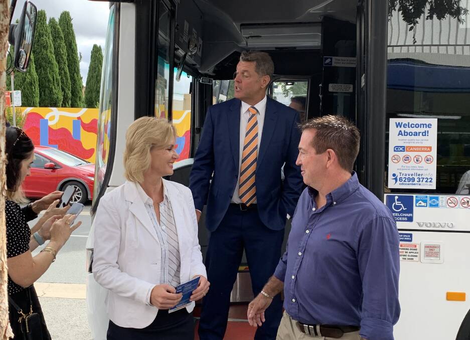 Member for Monaro Nichole Overall, CDC NSW operations manager Andrew Fogg and NSW Regional Transport Minister Paul Toole at the launch of the expanded cross-border bus services in Queanbeyan. Picture by Peter Brewer
