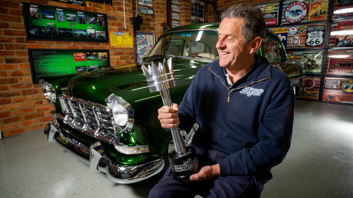 Peter Fitzpatrick, with the solid aluminium trophy for his show 'car of the decade'. Picture by Elesa Kurtz