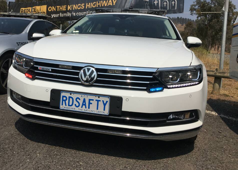 An unmarked road policing car, one of which was parked on the Federal Highway screening incoming traffic on Tuesday morning. Picture: Peter Brewer 